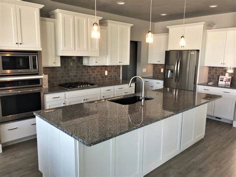 steel grey granite white cabinets|granite countertops white cabinets.